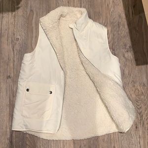 White fleece vest, size medium. Never worn